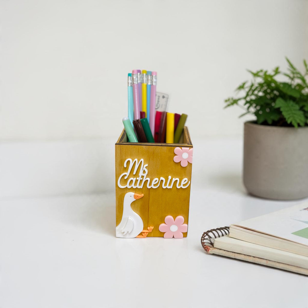 Personalised wooden pencil holder with goose design and educator name